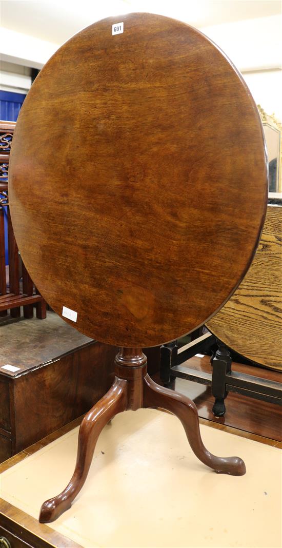 A mahogany tilt top tripod table, W.75cm